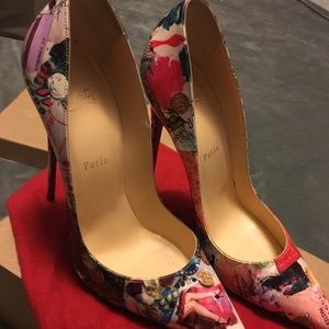 Authentic Christian Louboutin with original box.